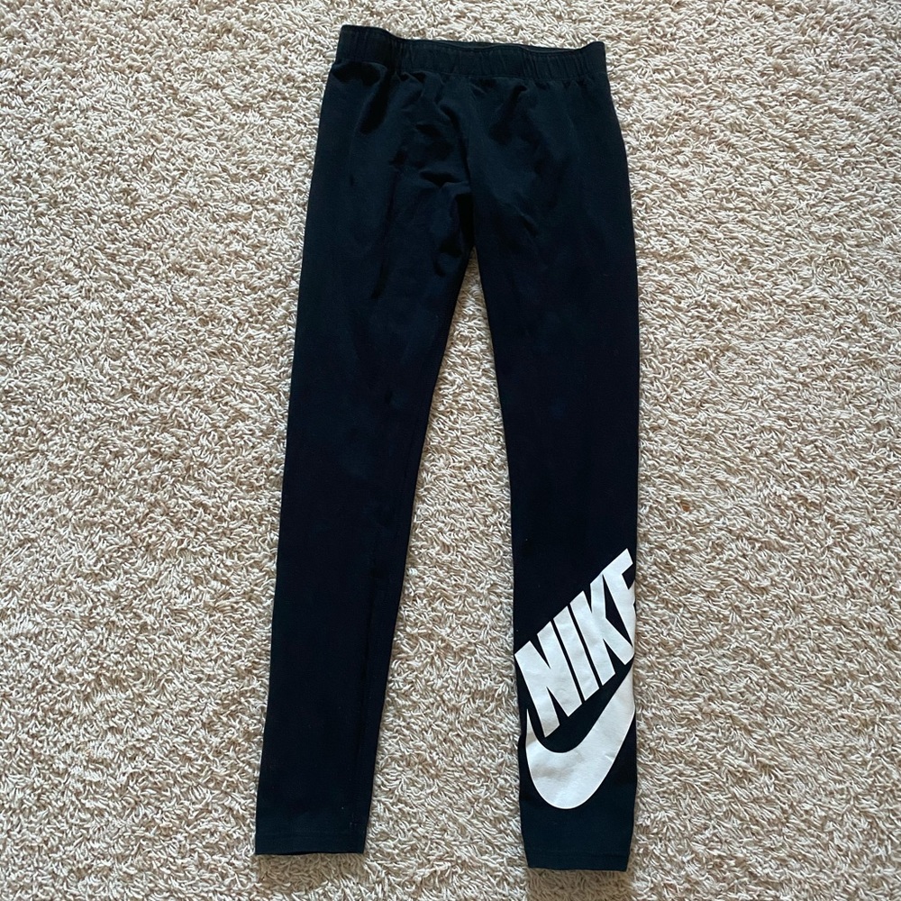 Black Nike Leggings with White Nike Swoosh